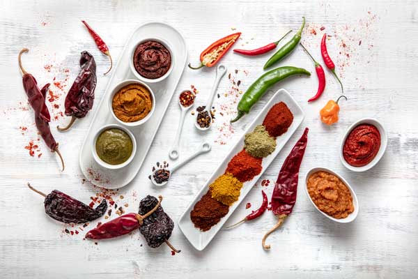 Capsicums authentic Mexican, Peruvian, U.S., and Indian chile peppers, dried, frozen, ground, pastes, and chili powder